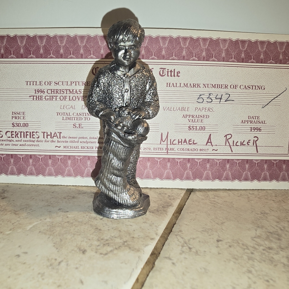 Silver Holiday Decor Figurine with Intricate Details